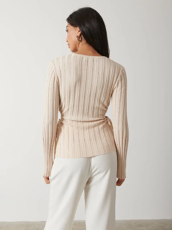 dahlia-cut-out-waist-knit-top-cream