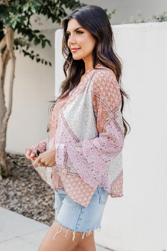 pink-and-orange-printed-bell-sleeve-blouse